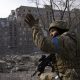 A Ukrainian serviceman guards his position in Mariupol, Ukraine, Saturday, March 12, 2022. (AP Photo/Mstyslav Chernov)